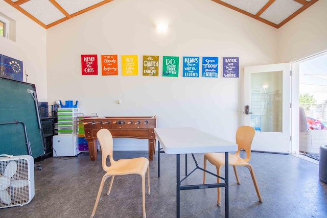 2658 E Alluvial Ave Unit 220, Fresno, CA 93720 - dining space featuring lofted ceiling and concrete floors