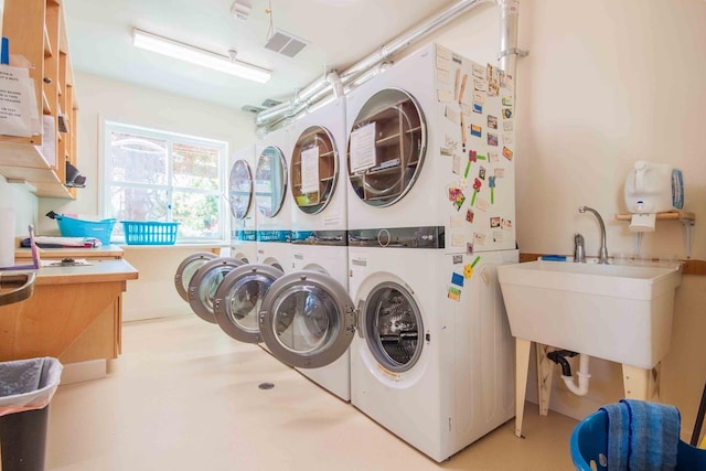 2658 E Alluvial Ave Unit 220, Fresno, CA 93720 - shared laundry room featuring estacked washer and dryer and separate washer and dryer
