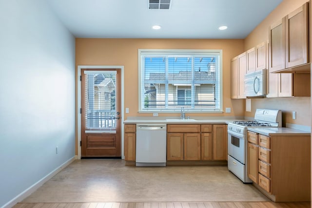 2658 E Alluvial Ave Unit 220, Fresno, CA 93720 - kitchen with white appliances, light countertops, and recessed lighting