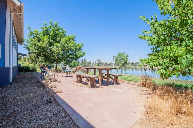 2658 E Alluvial Ave Unit 220, Fresno, CA 93720 - view of property's community featuring a patio area and a water view