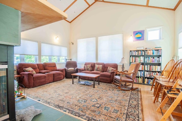 2658 E Alluvial Ave Unit 220, Fresno, CA 93720 - living room featuring wood finished floors and high vaulted ceiling