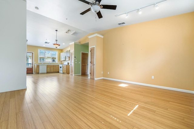 2658 E Alluvial Ave Unit 220, Fresno, CA 93720 - unfurnished living room with ceiling fan, light wood finished floors, rail lighting, and lofted ceiling
