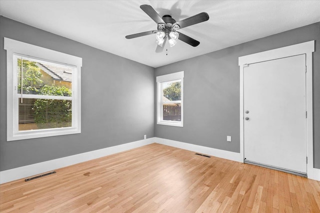 1461 N Harrison Ave, Fresno, CA 93728 - spare room with light wood-style flooring and a ceiling fan