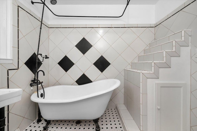 1461 N Harrison Ave, Fresno, CA 93728 - full bathroom featuring tile walls, a freestanding tub, and tile patterned flooring