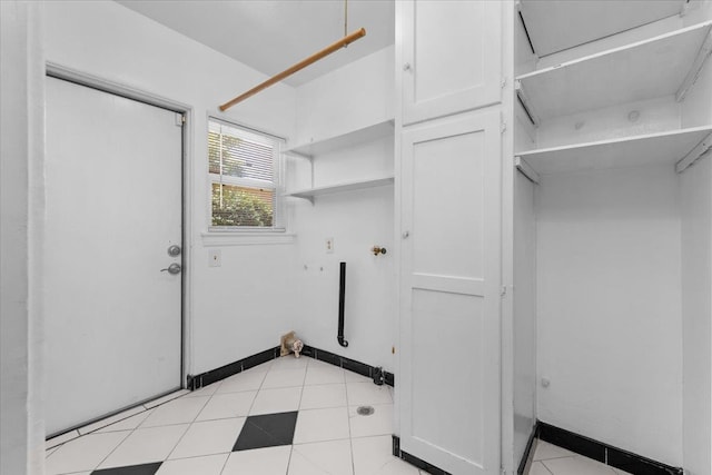 1461 N Harrison Ave, Fresno, CA 93728 - washroom featuring light tile patterned flooring