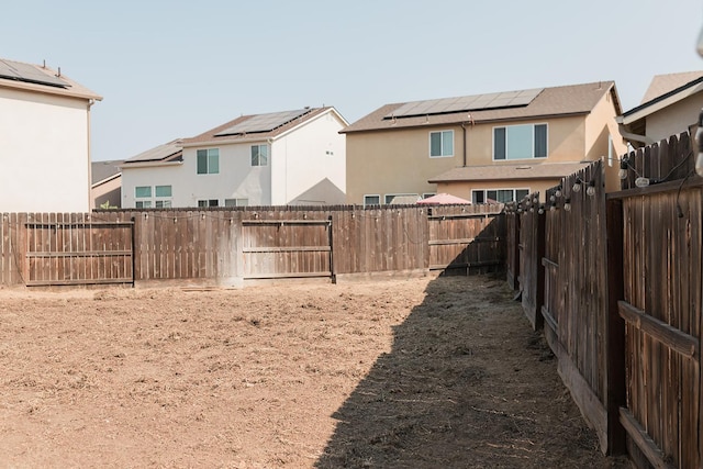 4438 N Sandrini Ave, Fresno, CA 93723 - fenced backyard with a residential view