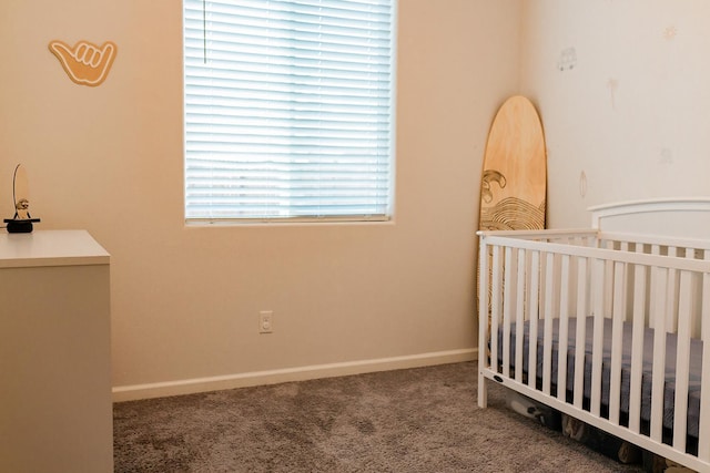 4438 N Sandrini Ave, Fresno, CA 93723 - bedroom with carpet flooring and a nursery area