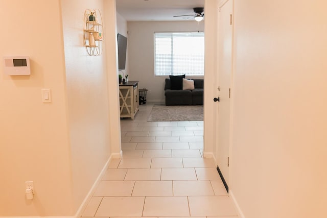 4438 N Sandrini Ave, Fresno, CA 93723 - hall with light tile patterned flooring and baseboards