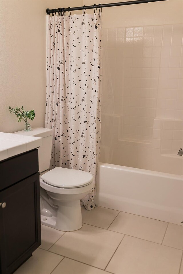 4438 N Sandrini Ave, Fresno, CA 93723 - bathroom with shower / tub combo, tile patterned flooring, and vanity