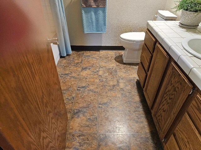 1509 Princeton Ave, Madera, CA 93637 - full bathroom with stone tile flooring and vanity