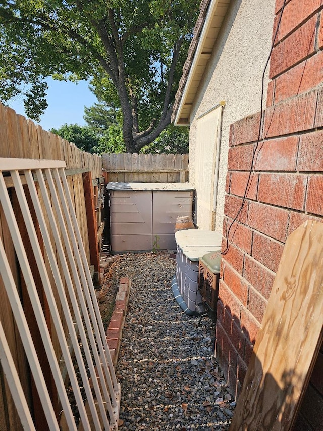 1509 Princeton Ave, Madera, CA 93637 - view of home's exterior with a fenced backyard and brick siding