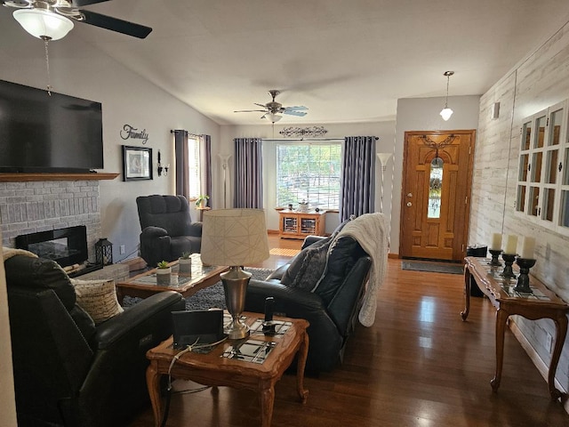 1509 Princeton Ave, Madera, CA 93637 - living area with a ceiling fan, wood finished floors, a brick fireplace, and lofted ceiling