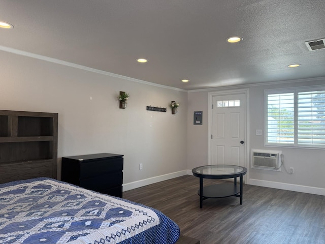 4741 W Mckinley Ave, Fresno, CA 93722 - bedroom with crown molding, dark wood-style floors, recessed lighting, and a wall unit AC