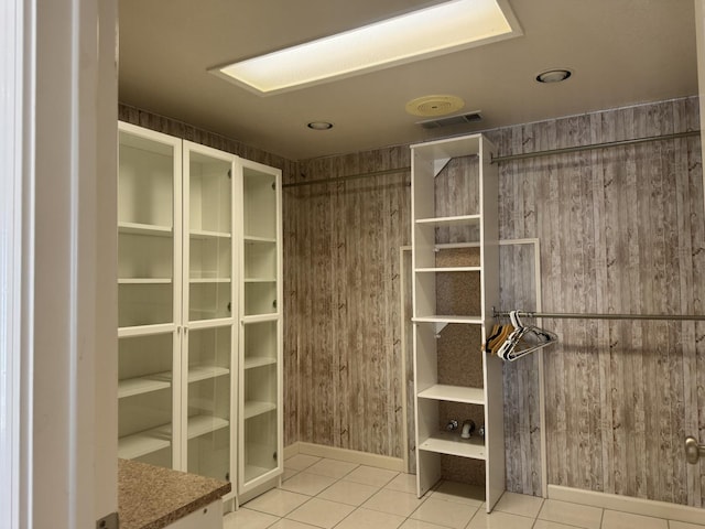 4741 W Mckinley Ave, Fresno, CA 93722 - walk in closet featuring tile patterned flooring