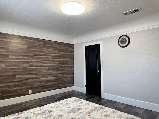 4741 W Mckinley Ave, Fresno, CA 93722 - bedroom with dark wood-style floors