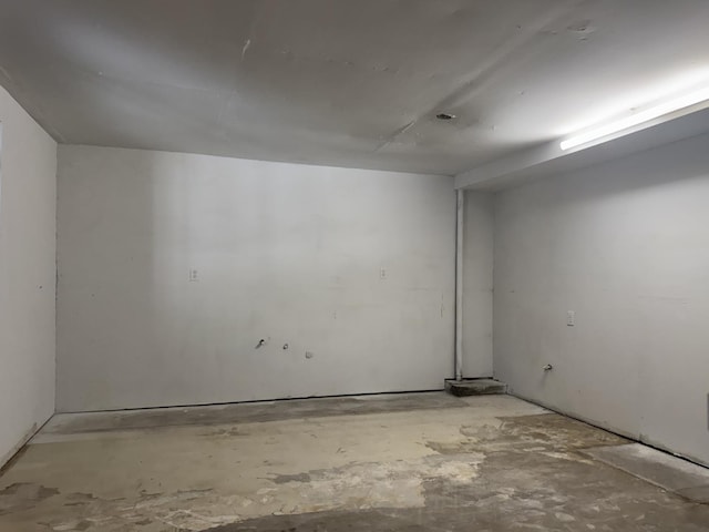 4741 W Mckinley Ave, Fresno, CA 93722 - empty room featuring unfinished concrete flooring