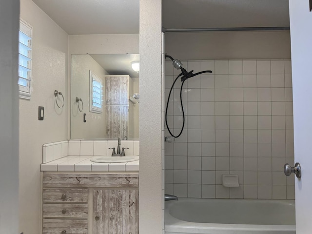 4741 W Mckinley Ave, Fresno, CA 93722 - bathroom with vanity and shower / bath combination