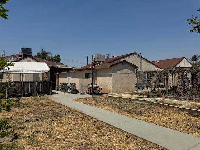 4741 W Mckinley Ave, Fresno, CA 93722 - view of yard with a garden and a patio area
