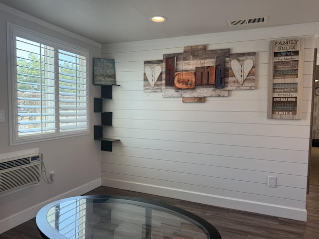 4741 W Mckinley Ave, Fresno, CA 93722 - bathroom with wood finished floors, ornamental molding, recessed lighting, a wall unit AC, and wooden walls
