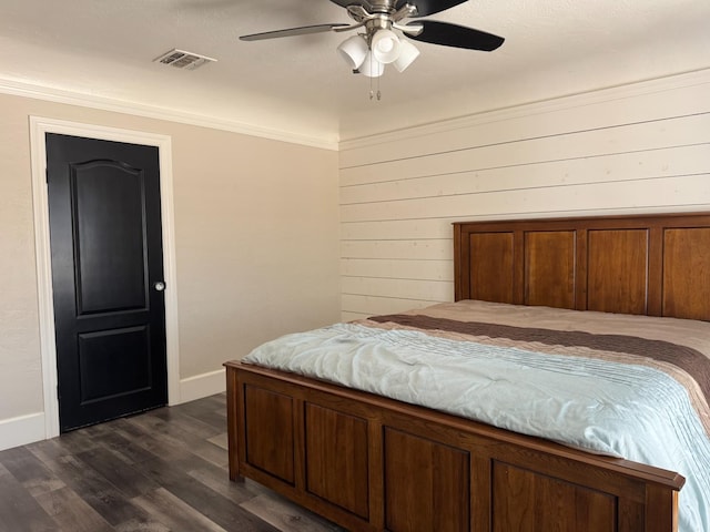 4741 W Mckinley Ave, Fresno, CA 93722 - bedroom featuring dark wood-style flooring, a ceiling fan, and ornamental molding
