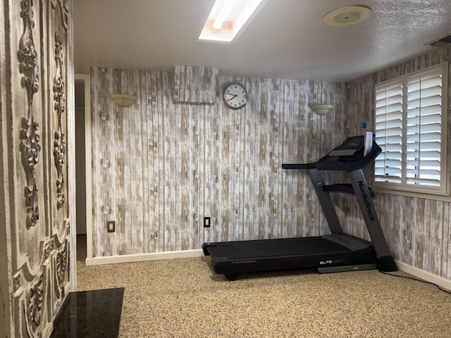 4741 W Mckinley Ave, Fresno, CA 93722 - exercise room with baseboards