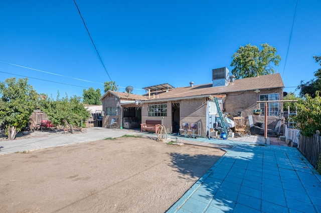 2323 E University, Fresno, CA 93703 - rear view of house with a patio area