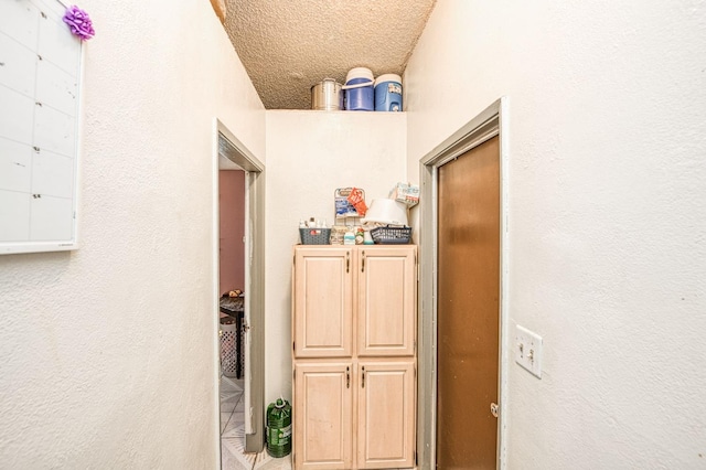 2323 E University, Fresno, CA 93703 - hallway featuring a textured ceiling