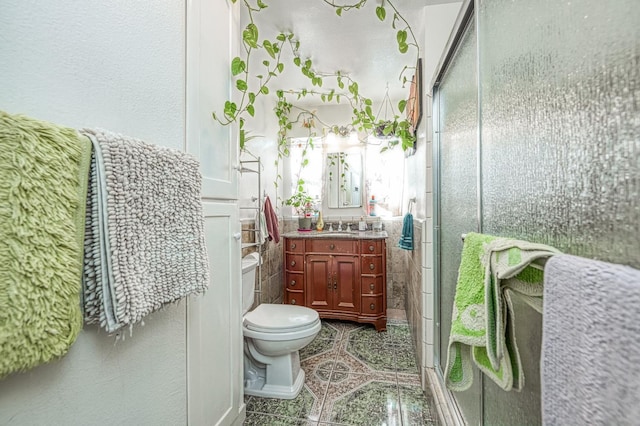 2323 E University, Fresno, CA 93703 - bathroom with vanity, a stall shower, and tile patterned floors