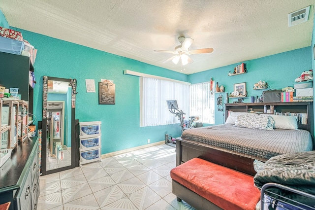 2323 E University, Fresno, CA 93703 - bedroom featuring a textured ceiling, a textured wall, and a ceiling fan