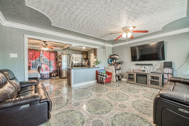 2323 E University, Fresno, CA 93703 - living room with a ceiling fan, ornamental molding, a textured ceiling, and a textured wall