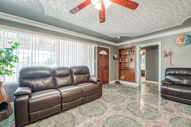 2323 E University, Fresno, CA 93703 - living area with crown molding, a ceiling fan, and a textured wall