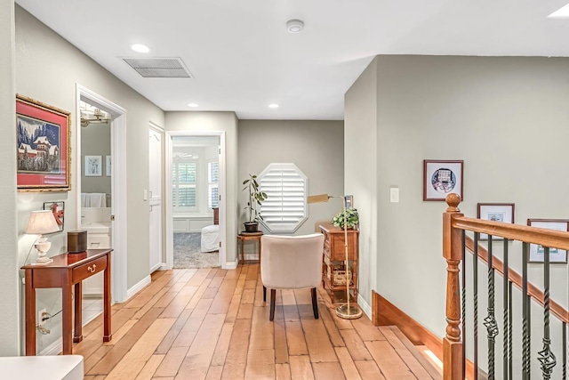 6609 N Dover Ct, Fresno, CA 93711 - corridor featuring light wood-style flooring and recessed lighting