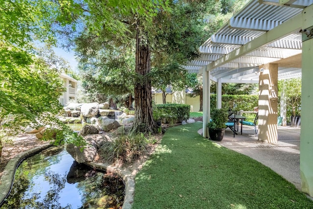 6609 N Dover Ct, Fresno, CA 93711 - view of grassy yard featuring a pergola and a patio