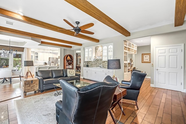 6609 N Dover Ct, Fresno, CA 93711 - living room featuring hardwood / wood-style flooring, a ceiling fan, beam ceiling, recessed lighting, and a chandelier