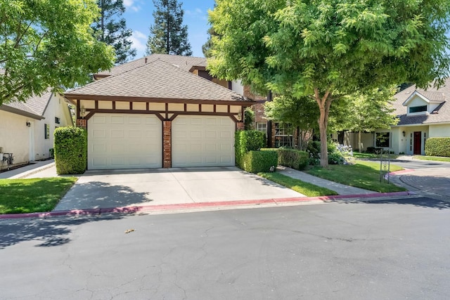 6609 N Dover Ct, Fresno, CA 93711 - view of front of house with a shingled roof, an attached garage, and concrete driveway