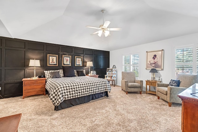6609 N Dover Ct, Fresno, CA 93711 - bedroom featuring lofted ceiling, multiple windows, a decorative wall, light carpet, and a ceiling fan