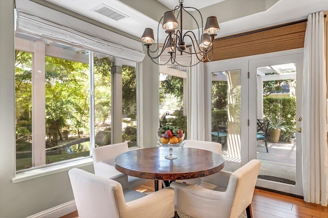 6609 N Dover Ct, Fresno, CA 93711 - sunroom / solarium featuring a chandelier and hardwood / wood-style flooring
