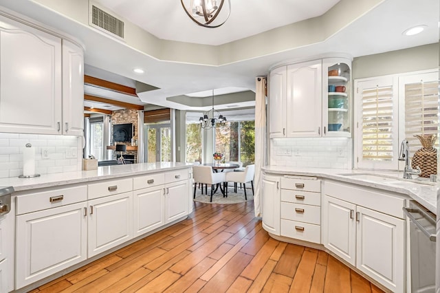 6609 N Dover Ct, Fresno, CA 93711 - kitchen with a chandelier, tasteful backsplash, glass insert cabinets, white cabinets, and recessed lighting