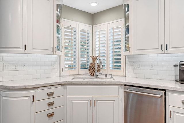 6609 N Dover Ct, Fresno, CA 93711 - kitchen featuring stainless steel dishwasher, white cabinetry, decorative backsplash, and glass insert cabinets