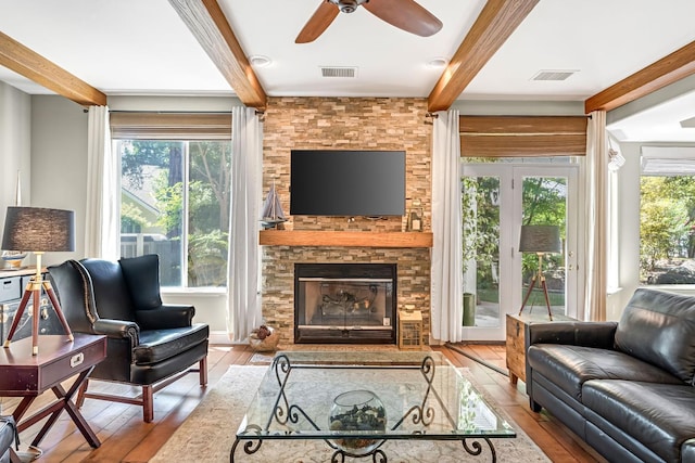 6609 N Dover Ct, Fresno, CA 93711 - living area featuring beamed ceiling, hardwood / wood-style flooring, ceiling fan, and a fireplace