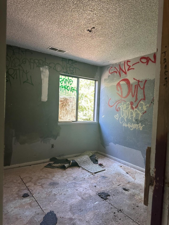 2244 N Prospect, Fresno, CA 93722 - empty room featuring a textured ceiling