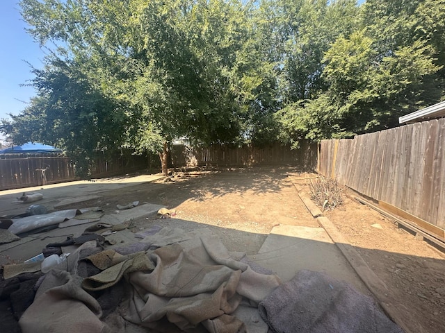 2244 N Prospect, Fresno, CA 93722 - fenced backyard with a patio area