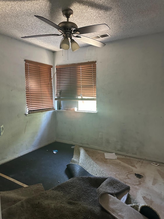 2244 N Prospect, Fresno, CA 93722 - unfurnished room featuring a textured ceiling and ceiling fan