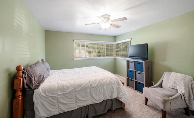 1556 E Loftus Ln, Fresno, CA 93710 - bedroom featuring carpet floors and a ceiling fan
