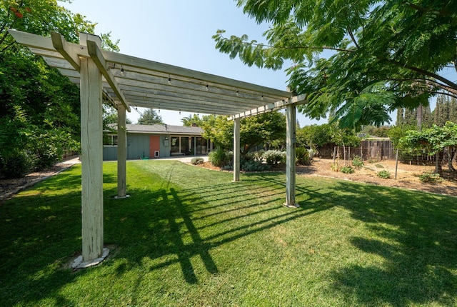 1556 E Loftus Ln, Fresno, CA 93710 - view of yard with a pergola