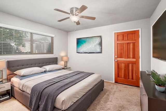 1556 E Loftus Ln, Fresno, CA 93710 - bedroom with light colored carpet and ceiling fan
