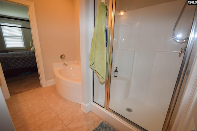 bathroom with plus walk in shower and tile floors