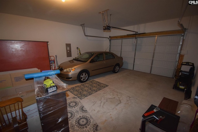 garage featuring a garage door opener