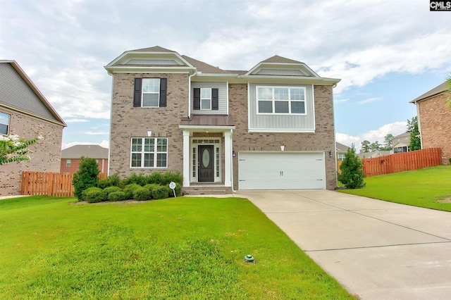 view of front of property featuring a front lawn and a garage