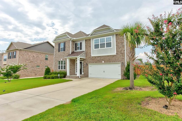 view of front of home with a front lawn and a garage